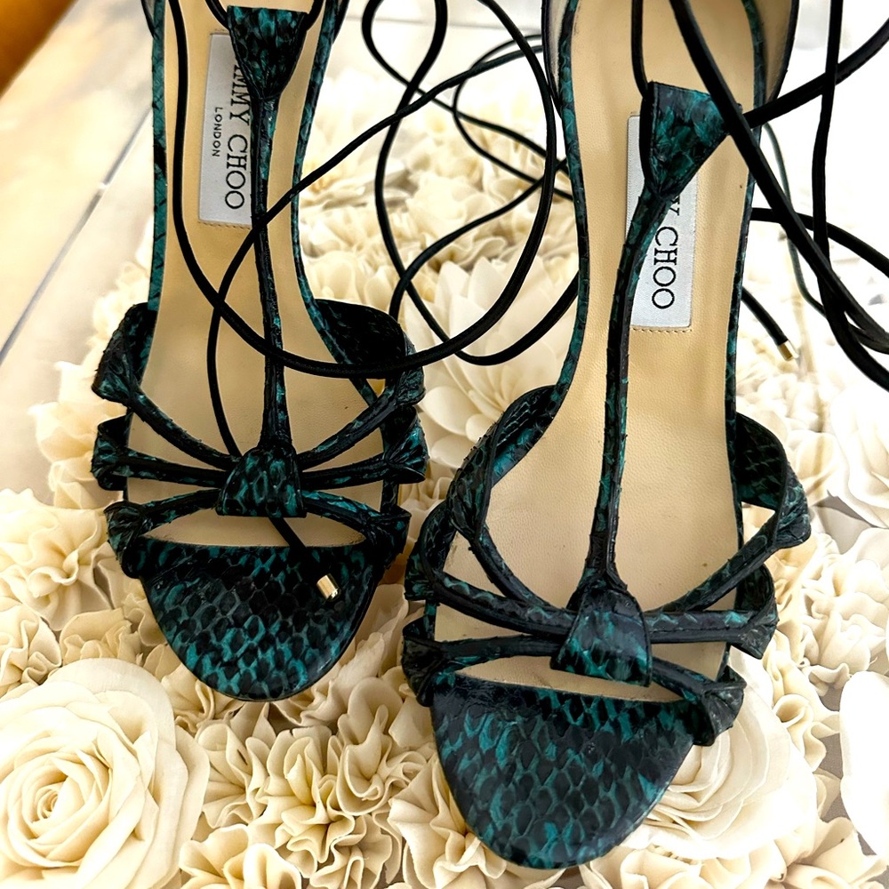 Authentic Jimmy Choo teal/black lace up heels. Sleek, sexy and stylist!